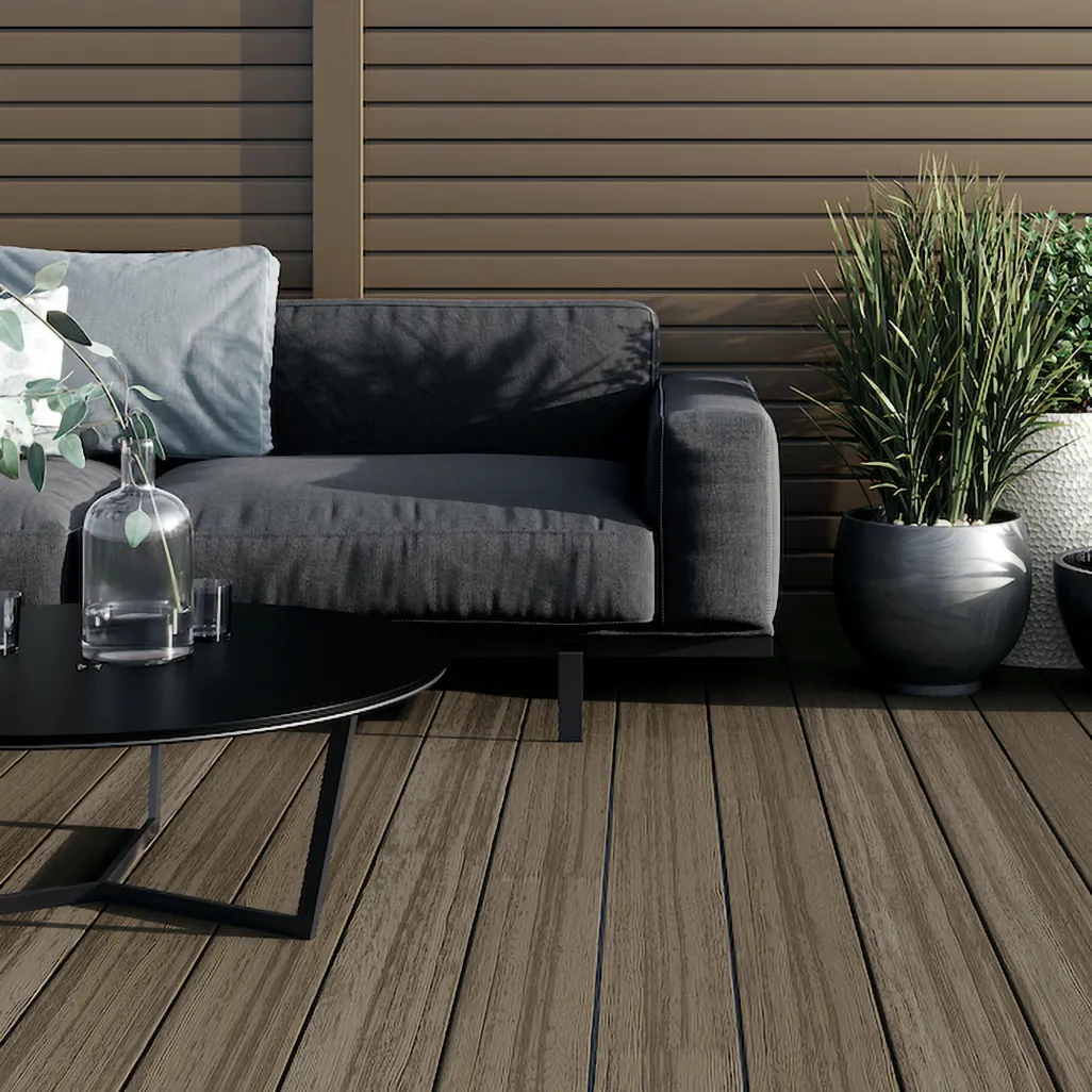 Step 10: Finish the deck – two options:
Option 1: Fascia Board
Attach fascia trim to create a clean edge after installing the main boards.
Align the first trim with the decking’s top edge.
Use colour-coded screws to fix the trim into the joists – use two screws per joist every 400mm.
Pre-drill and countersink the screws for a good finish and to prevent cracking.
Option 2: Angle Trim
Use additional decking boards to clad the decked area’s face.
Install the boards in a similar manner to decking – you can use countersunk screws instead of T-clips.
Pin the angle trim to the decking’s top edge using colour-coded screws – use one screw per joist every 400mm.
Pre-drill and countersink the screws, as above.